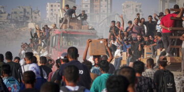 U.N. food agency halves West Bank aid because of funding shortages, warns new cuts may be needed