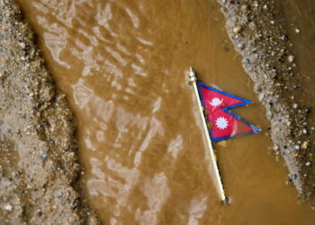 Mass burials in Nepal as death toll from flash floods exceeds 1,000