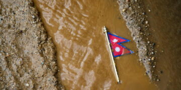 Mass burials in Nepal as death toll from flash floods exceeds 1,000
