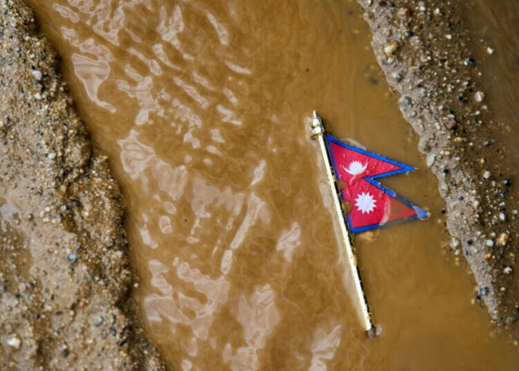 Mass burials in Nepal as death toll from flash floods exceeds 1,000