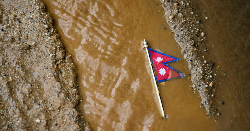 Mass burials in Nepal as death toll from flash floods exceeds 1,000