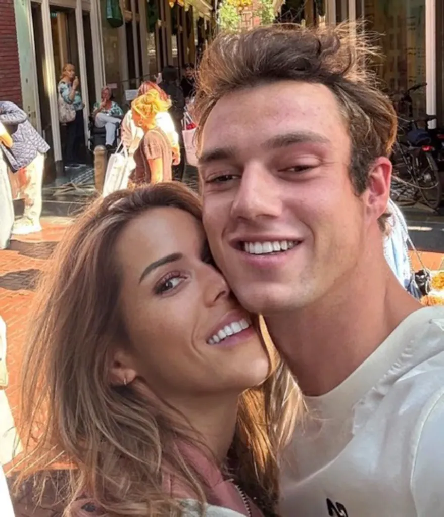 Tiphaine Auzière, 42, and her boyfriend Antoine Lecomte, 22, smiling together in a close-up selfie.