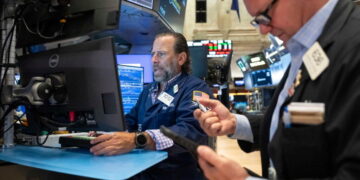 Wall Street rises as tech stocks climb and oil prices, bond yields hold relatively steady