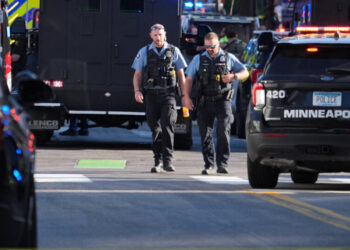 2 Killed and 2 Officers Shot at Minneapolis Apartment Building
