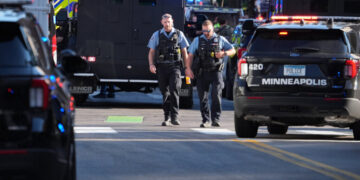 2 Killed and 2 Officers Shot at Minneapolis Apartment Building