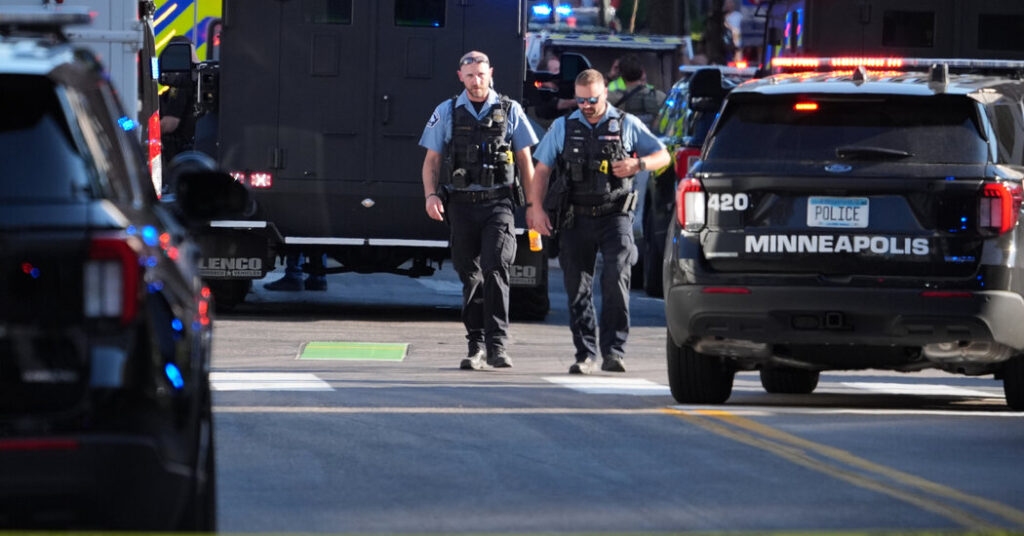 2 Killed and 2 Officers Shot at Minneapolis Apartment Building