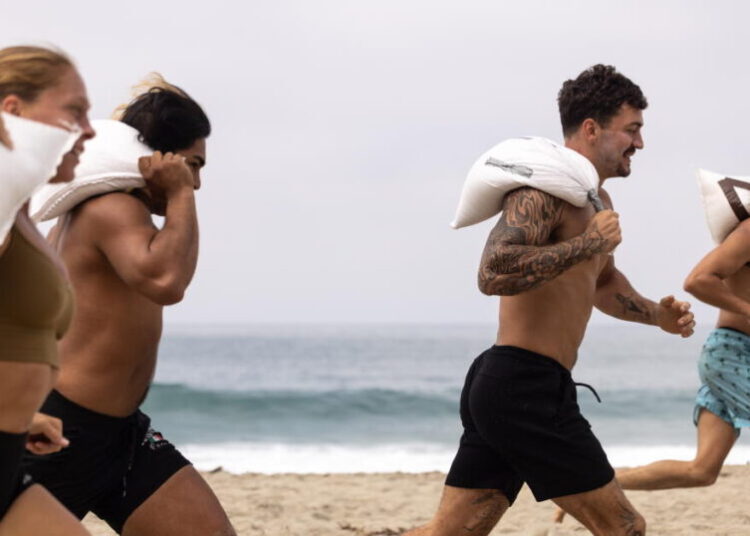 This free ‘Sandbag Saturdays’ workout on the beach is killer — and fans can’t get enough