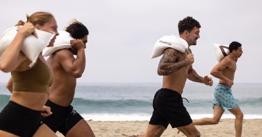This free ‘Sandbag Saturdays’ workout on the beach is killer — and fans can’t get enough