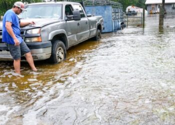 Texas evacuates an assisted living facility as flooding from Tropical Storm Edouard strands drivers and cuts power