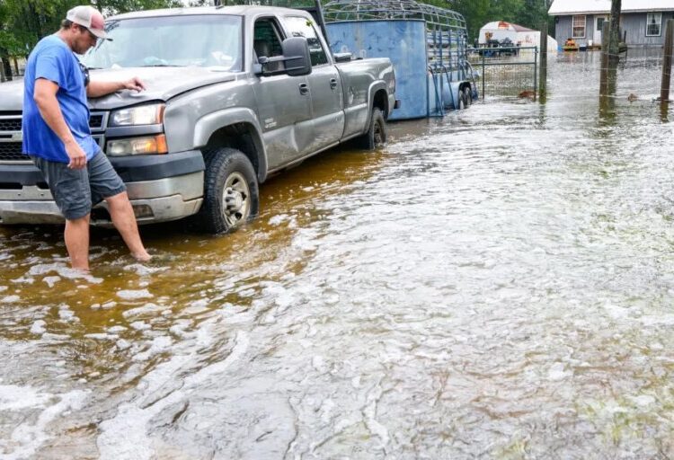 Texas evacuates an assisted living facility as flooding from Tropical Storm Edouard strands drivers and cuts power