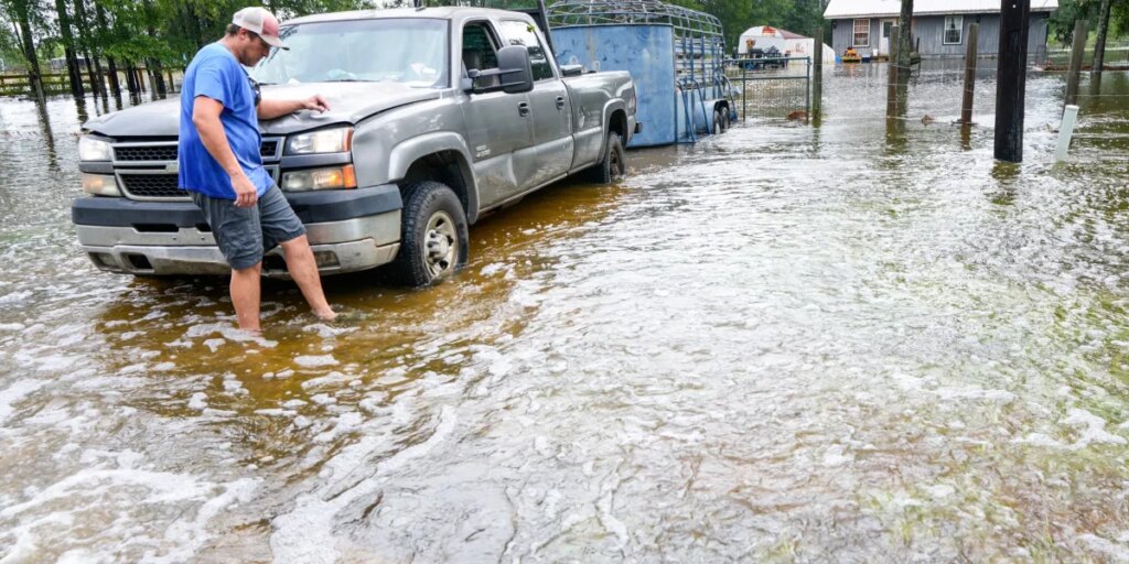 Texas evacuates an assisted living facility as flooding from Tropical Storm Edouard strands drivers and cuts power