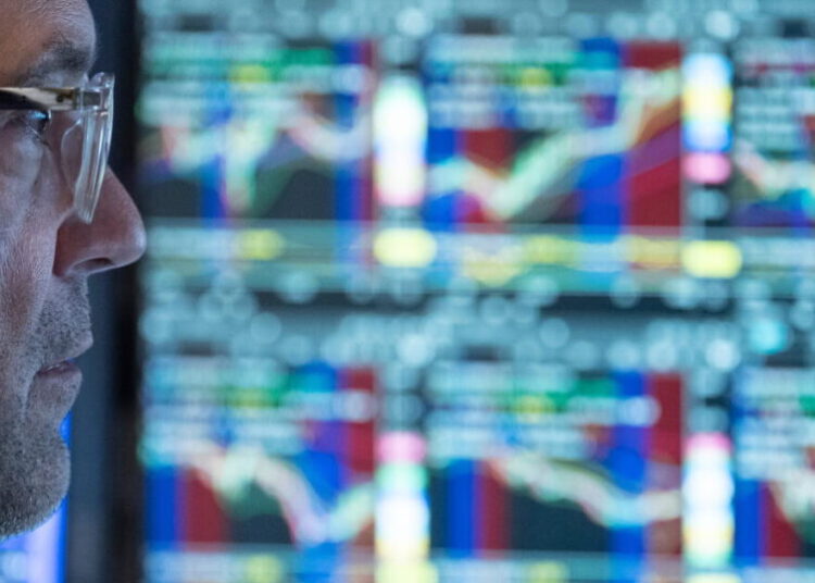 Tech stocks lead a rally on Wall Street as bond yields ease some more