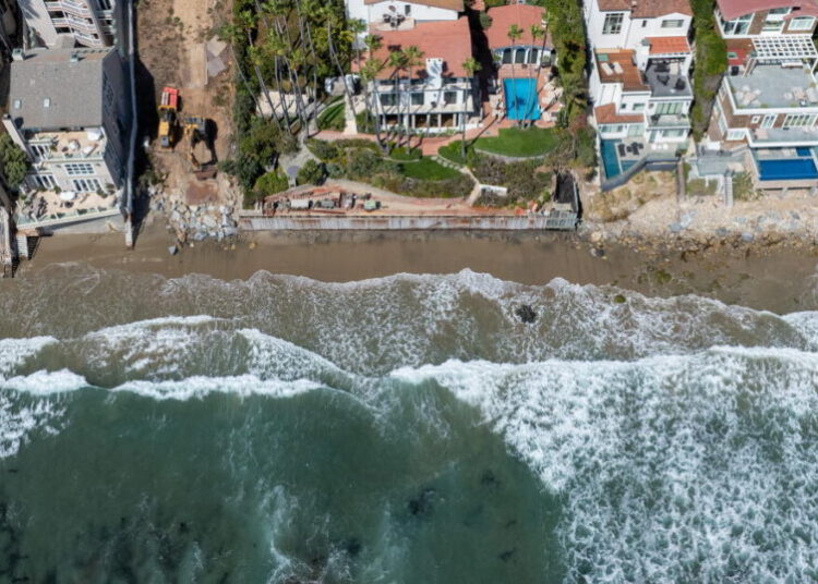 A billionaire was accused of stealing Malibu sand. Now he’s donating a new beach to the public