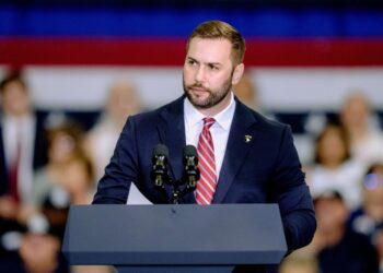 Republican House candidates tone down Trump on their campaign websites