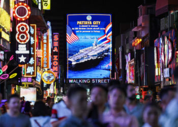After Months at War, Brief Solace in a Party Town Far From Home