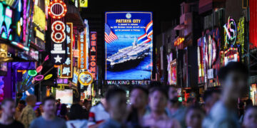After Months at War, Brief Solace in a Party Town Far From Home