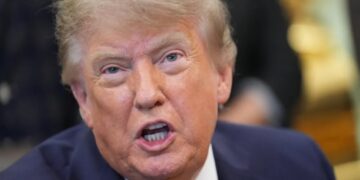 Trump calls the Iran war — which has left 18 U.S. service members dead — ‘small potatoes’ and backs Vance’s view that it’s not a war