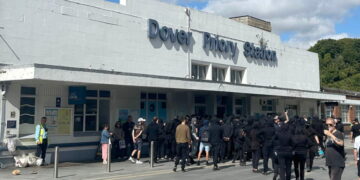 Masked men block roads into Dover port in England in anti-immigrant protest