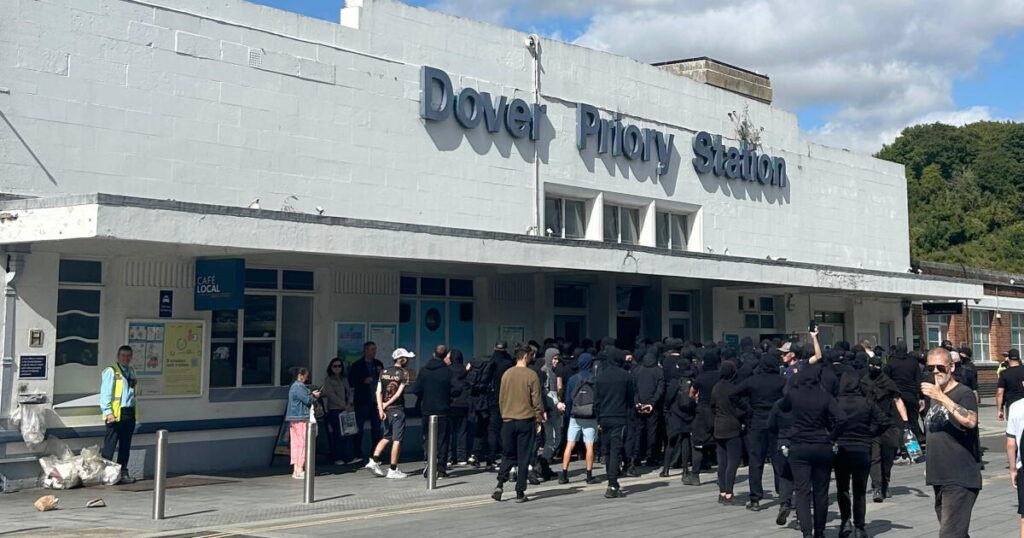 Masked men block roads into Dover port in England in anti-immigrant protest