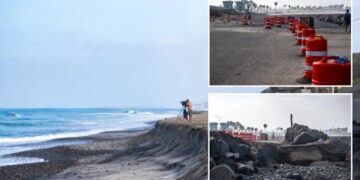 California beach swallowed by furious surf as Labor Day weekend crowds face parking nightmare