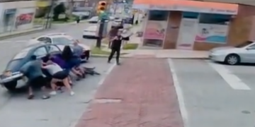 These bystanders lifted a car to save a woman who was trapped underneath