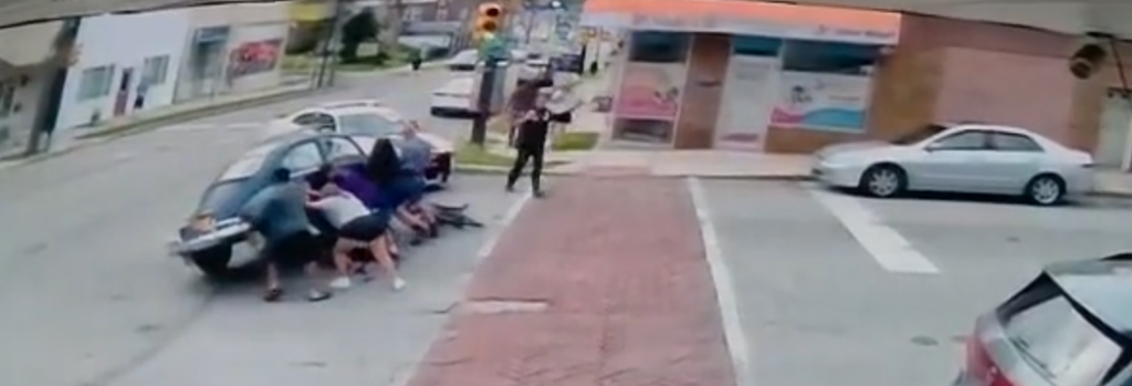 These bystanders lifted a car to save a woman who was trapped underneath
