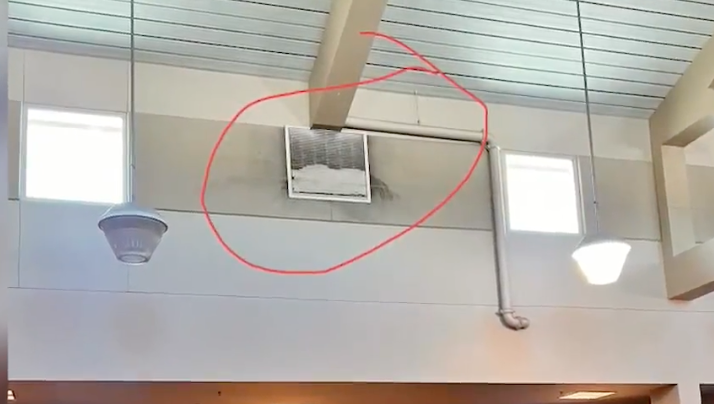 A red circle highlights a moldy air vent on the wall of Del Sur Elementary.