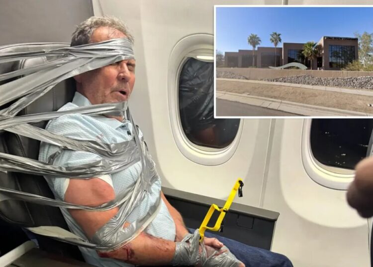 Unruly airline passenger who had to be duct-taped to seat after N-word meltdown fired from Arizona realty company