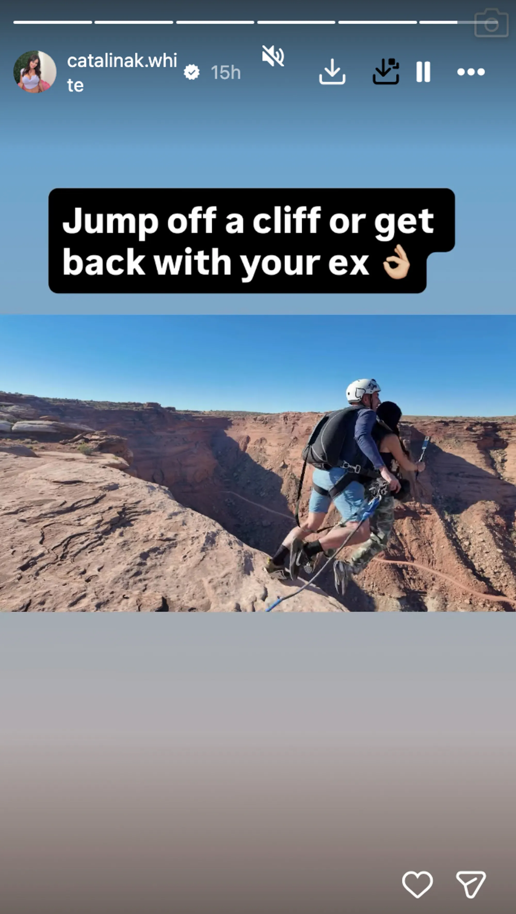Two people in rappelling gear standing on the edge of a cliff, with text overlay 