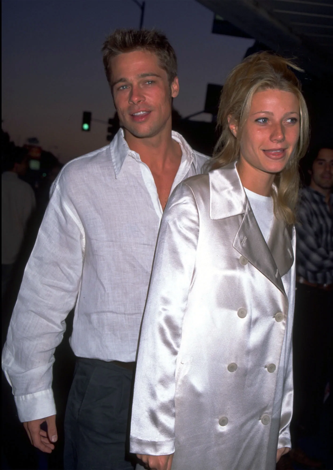 Brad Pitt and Gwyneth Paltrow standing together.
