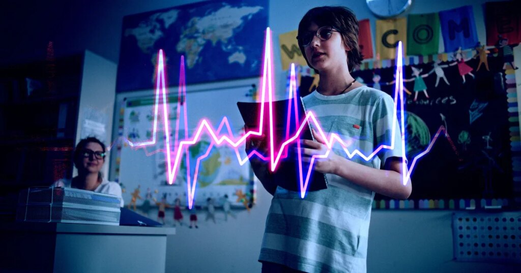 AI School Hooking Children Up to Heart Monitor in Front of Class While Playing Critiques of Their Work