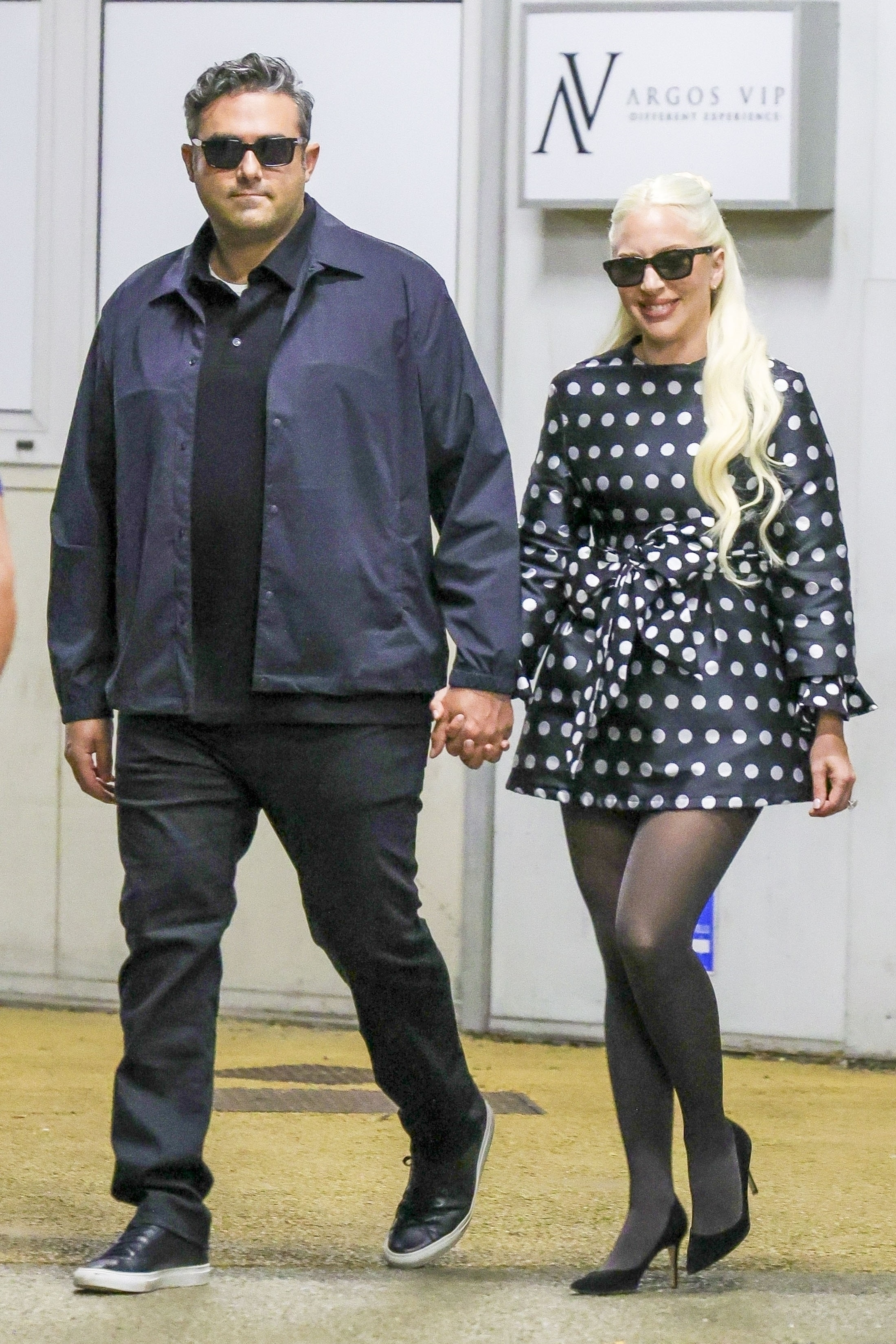 Lady Gaga and Michael Polansky arrive hand in hand at the Venice Film Festival.