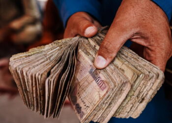 How can the elderly get help paying their bills?