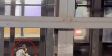 Young man and woman caught on video sitting on NYC subway tracks before being fatally struck 