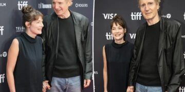 Liam Neeson, 74, holds hands with costar Stella Stocker on Toronto International Film Festival red carpet