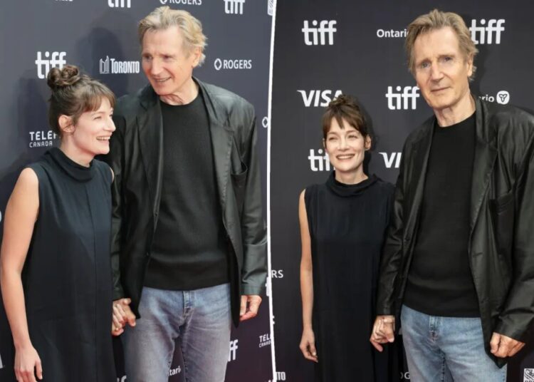 Liam Neeson, 74, holds hands with costar Stella Stocker on Toronto International Film Festival red carpet