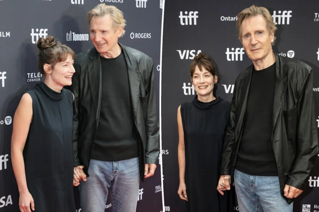 Liam Neeson, 74, holds hands with costar Stella Stocker on Toronto International Film Festival red carpet