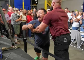Heckler pushed out of heated Vance event as MAGA crowd breaks into chants