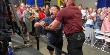 Heckler pushed out of heated Vance event as MAGA crowd breaks into chants