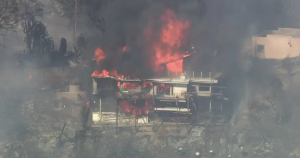 Brush fire triggers evacuation warnings in La Habra Heights as flames threaten structures