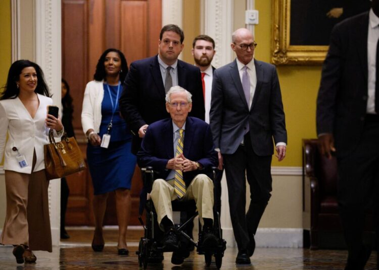 McConnell returns to Senate, casting first vote since suffering a fall in June