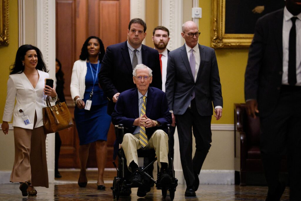 McConnell returns to Senate, casting first vote since suffering a fall in June