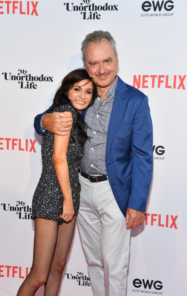 Julia Haart and Silvio Scaglia embracing at the premiere of Netflix's 