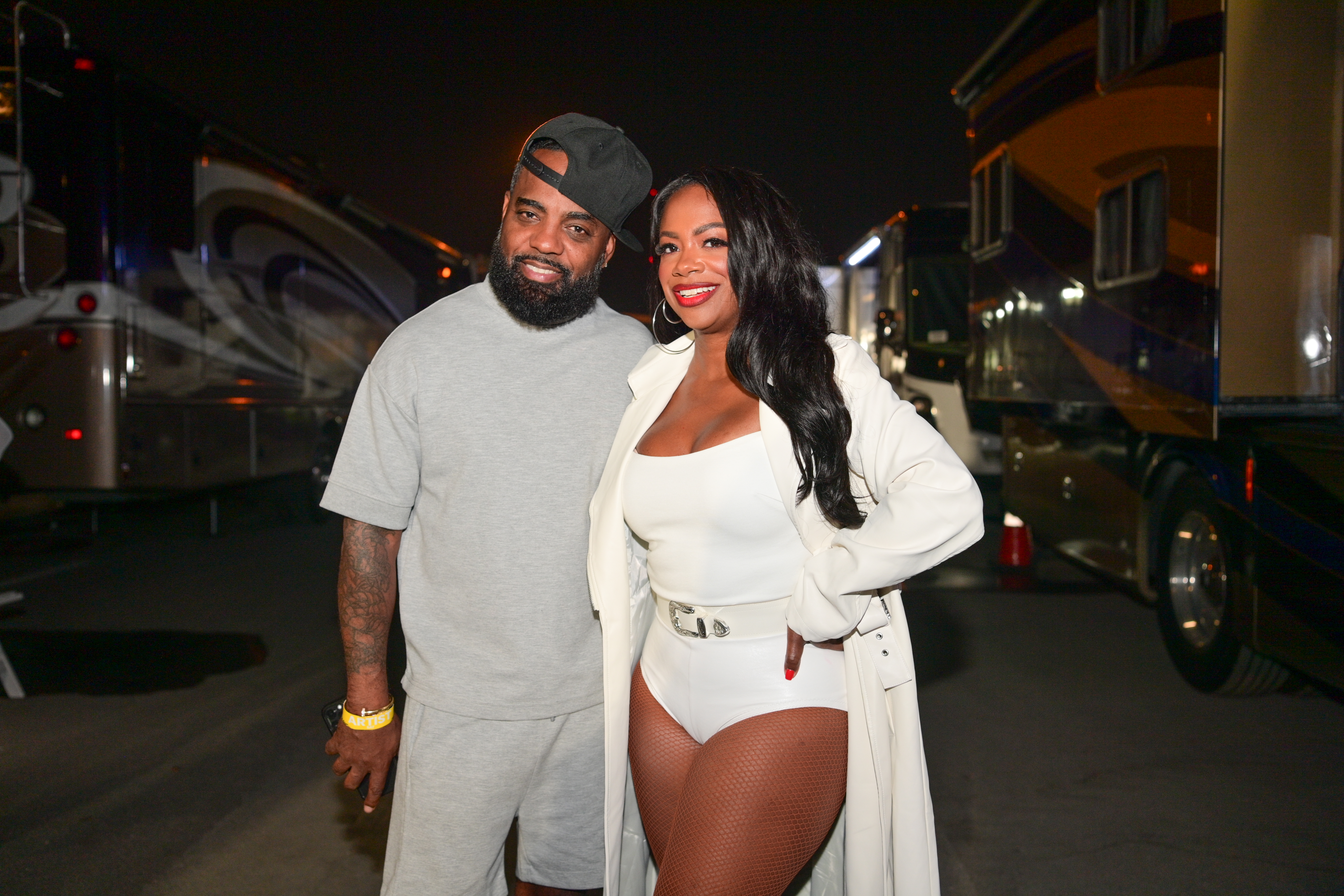 Todd Tucker and Kandi Burruss pose for a photo.