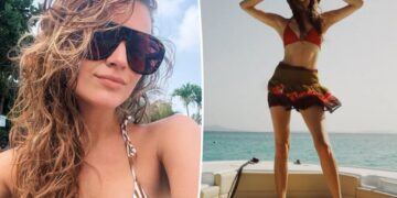 Kelsea Ballerini flaunts her abs in red bikini as she rings in her 33rd birthday