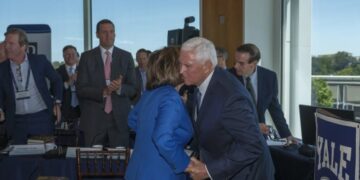 Exclusive: Inside the room where Nancy Pelosi and Mike Pence shared an emotional embrace in front of America’s leadership class