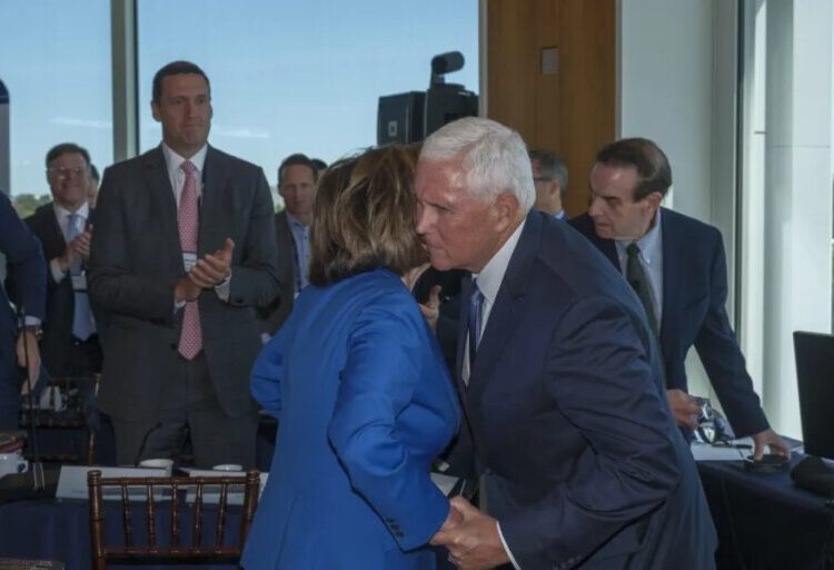 Exclusive: Inside the room where Nancy Pelosi and Mike Pence shared an emotional embrace in front of America’s leadership class