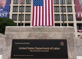 Claims for unemployment benefits drop to the lowest since mid-July as layoffs remain low