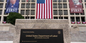 Claims for unemployment benefits drop to the lowest since mid-July as layoffs remain low
