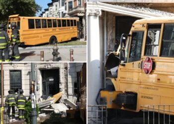 NYC yellow school bus slams into apartment building in dramatic morning rush scene